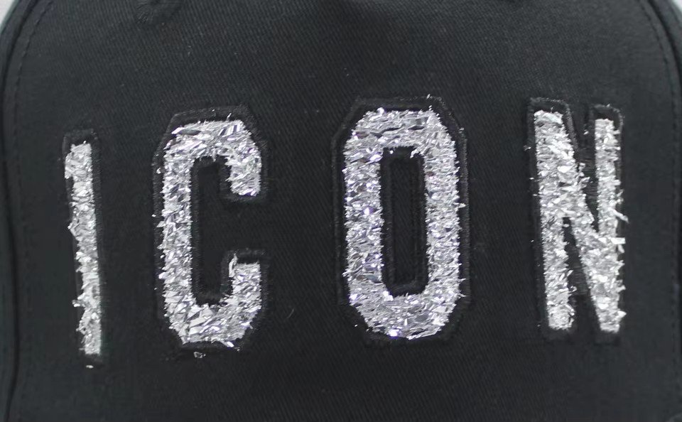 ICON lettering in glitter chenille felt applique on a black cap